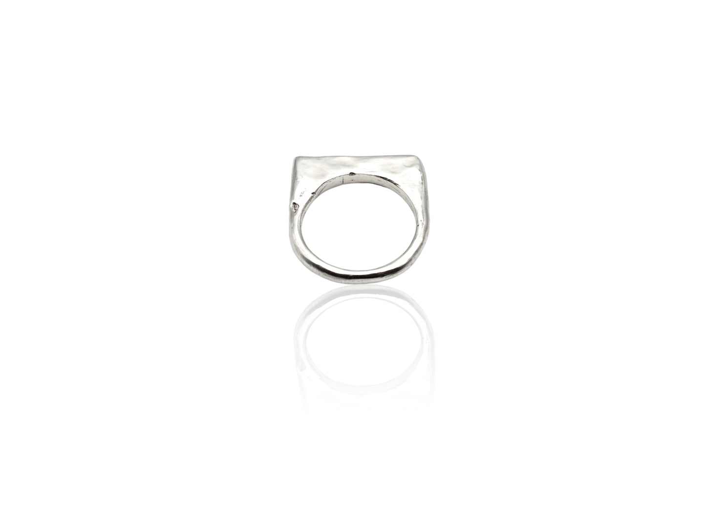 Silver ring displayed on white background. silver ring with sculpted organic design and texture. Ring is designed by soul full studio and handmade with lost wax casting and metal smithing techniques.
