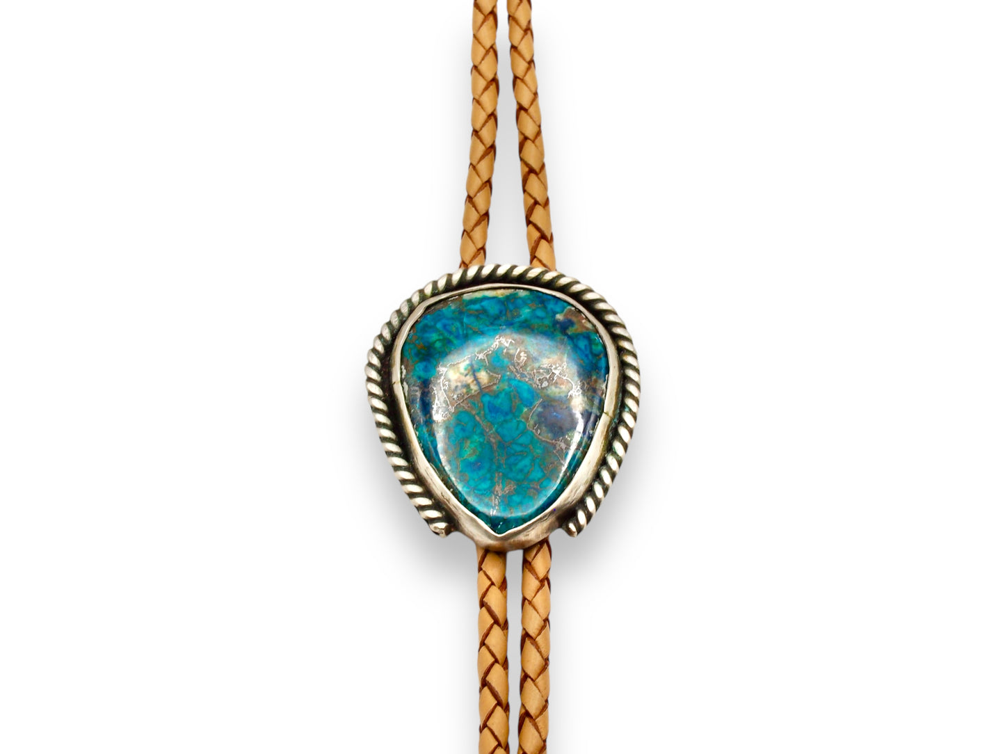 Bolo tie with shattuckite chrysocolla set in sterling silver and tan leather cord. Handmade bolo tie using metal smith techniques.
