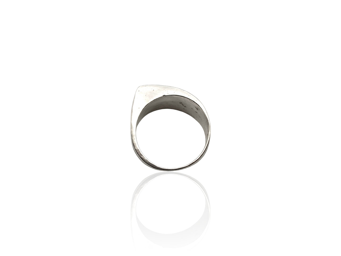 Silver ring on white background. Handmade by Soul Full Studio using lost wax cast and metalsmithing techniques. Semifine and fine jewelry.