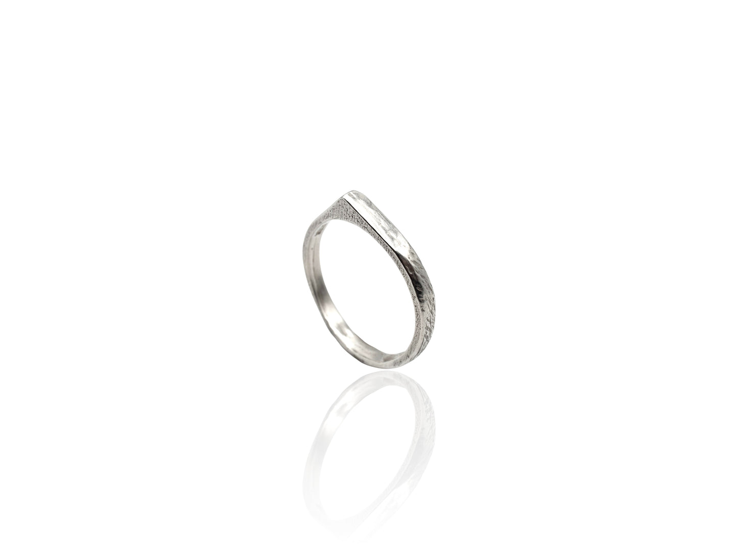 Silver thin ring on white background. Handmade by Soul Full Studio using lost wax cast and metalsmithing techniques. Semifine and fine jewelry. Jewelry inspired by mountains
