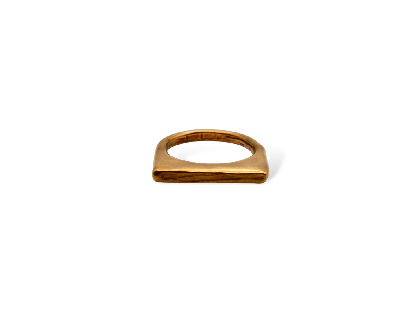 Bronze ring displayed on white background. Bronze ring with sculpted organic design and texture. Ring is designed by soul full studio and handmade with lost wax casting and metal smithing techniques. Jewelry inspired by Georgia Okeefe