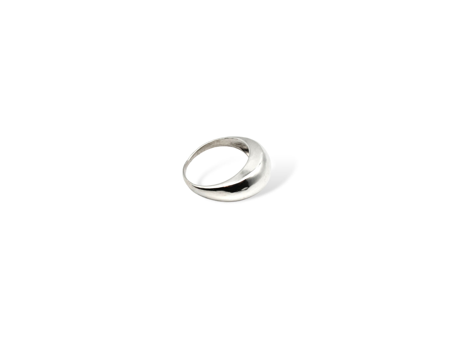 Silver thin dome ring on white background. Handmade by Soul Full Studio using lost wax cast and metalsmithing techniques. Semifine and fine jewelry.