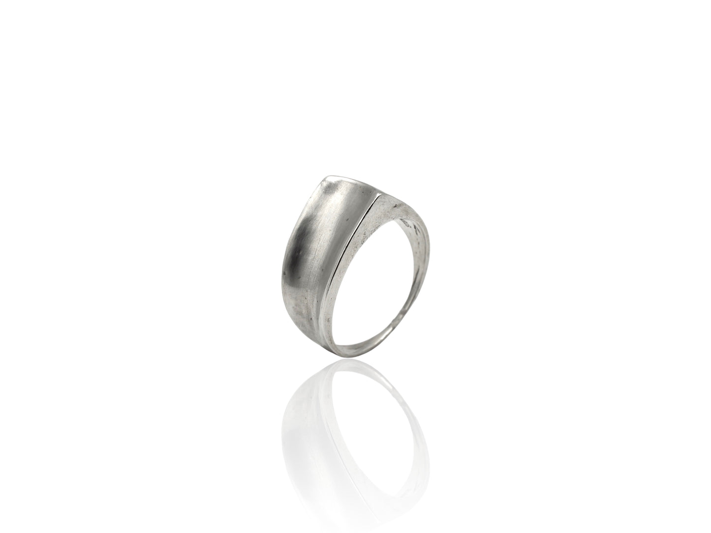 Silver ring on white background. Handmade by Soul Full Studio using lost wax cast and metalsmithing techniques. Semifine and fine jewelry.