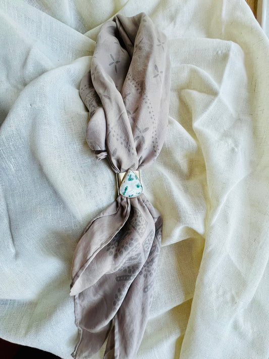 Wild rag bronze bandana slide with tree agate stone. Displayed on silk ozma bandana. 