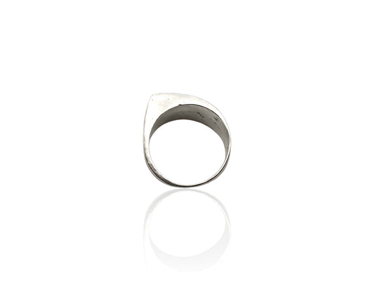 Silver ring on white background. Handmade by Soul Full Studio using lost wax cast and metalsmithing techniques. Semifine and fine jewelry. 