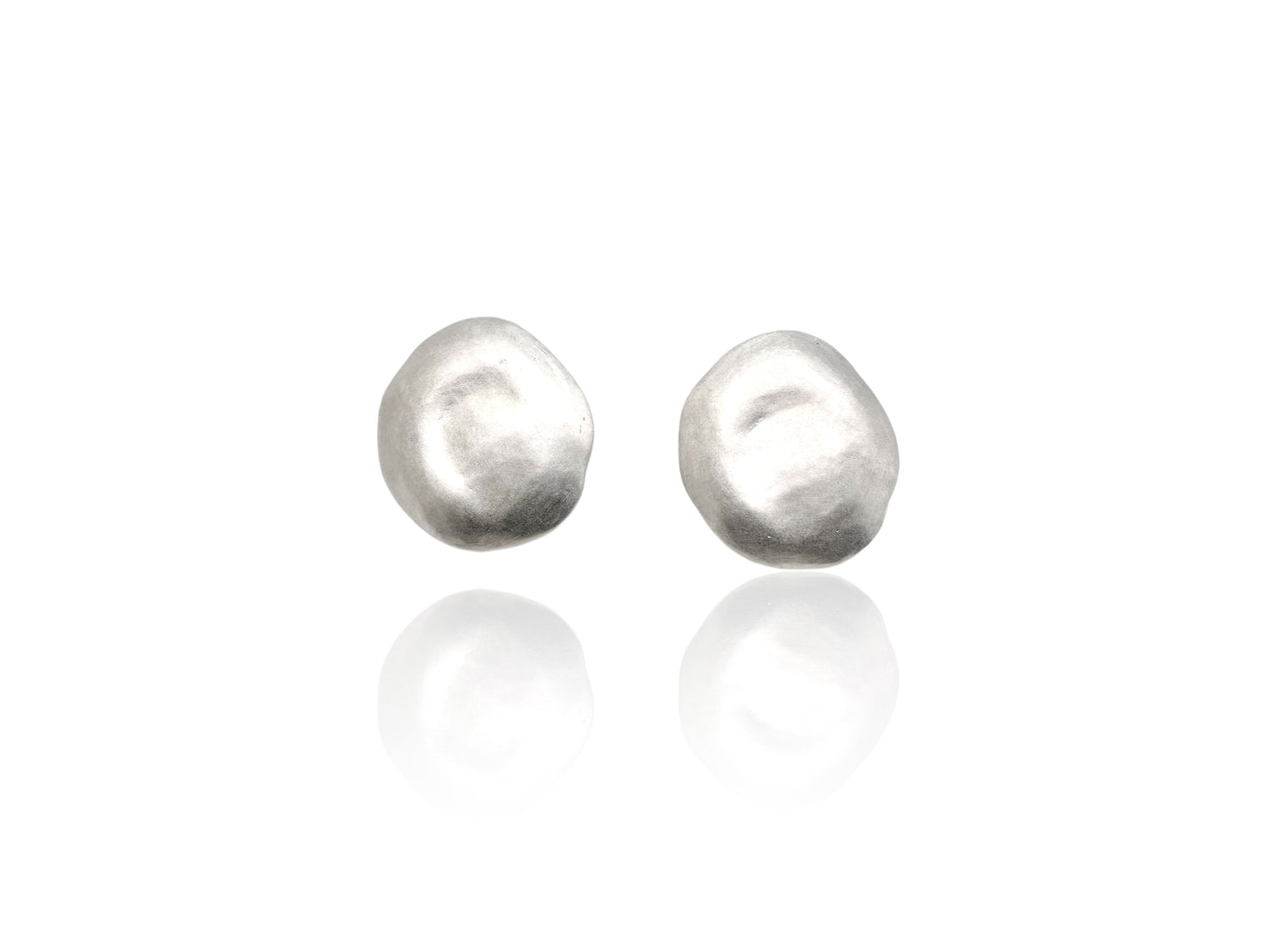 Sky earring in sterling silver on white background. 